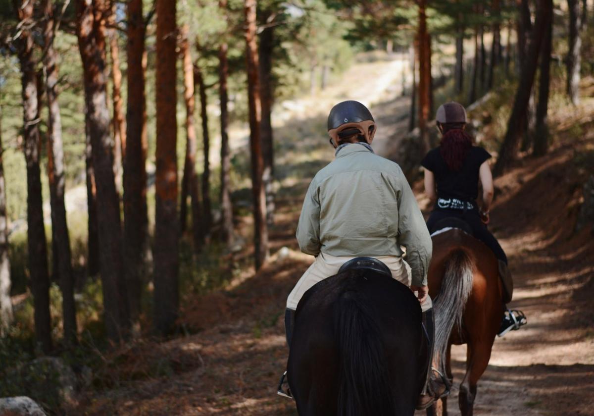 Riders on horseback.