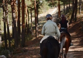 Riders on horseback.