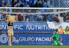 Molina, left, after his late own goal made it 2-1.