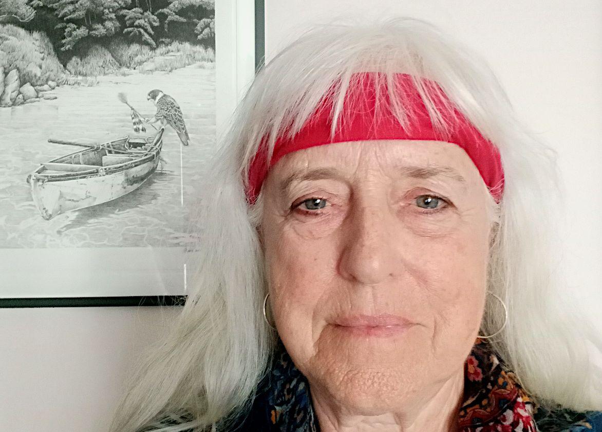 Michèle Savelle with one of her paintings.