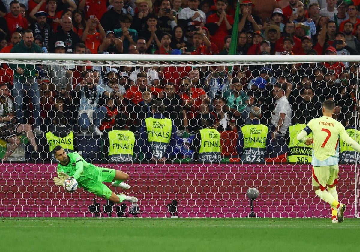 Diogo Costa saves Álvaro Morata's penalty in the shootout.