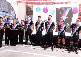 Members of the club's senior, women's, youth and Genuine teams modelled the new strip.