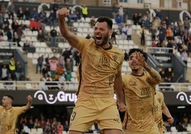 The Croatian forward celebrates giving Malaga all three points.