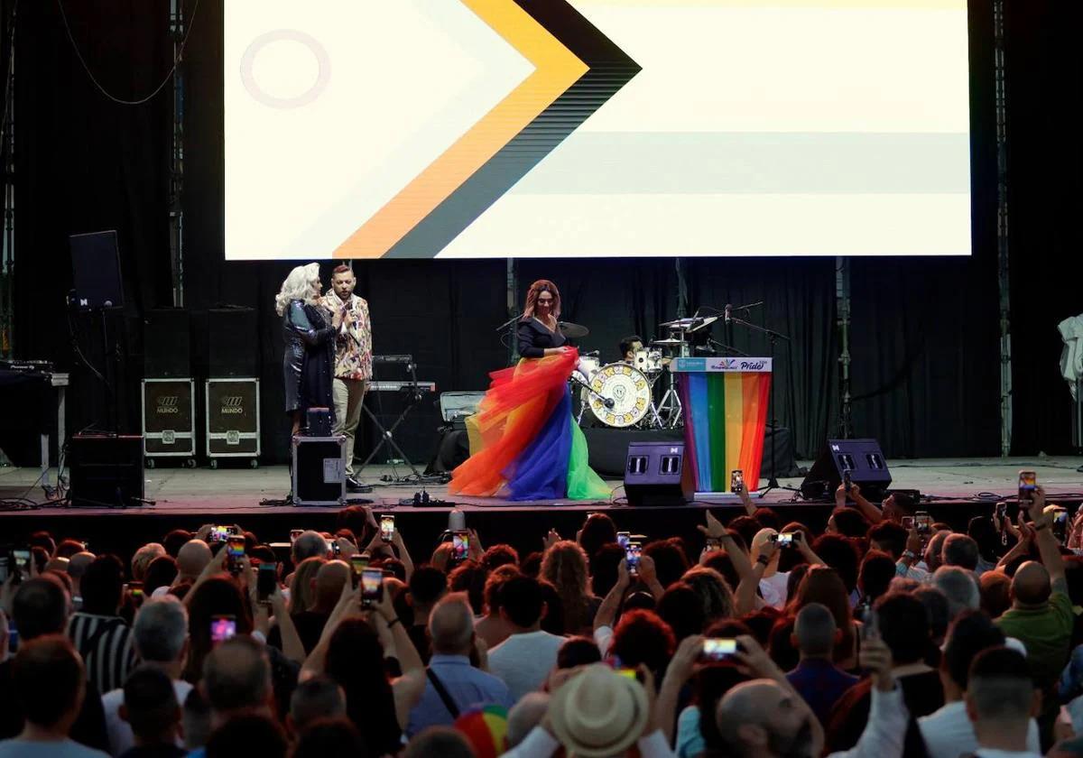 Journalist and presenter Toni Moreno takes the stage in a rainbow skirt on the opening night of Pride in Torremolinos.